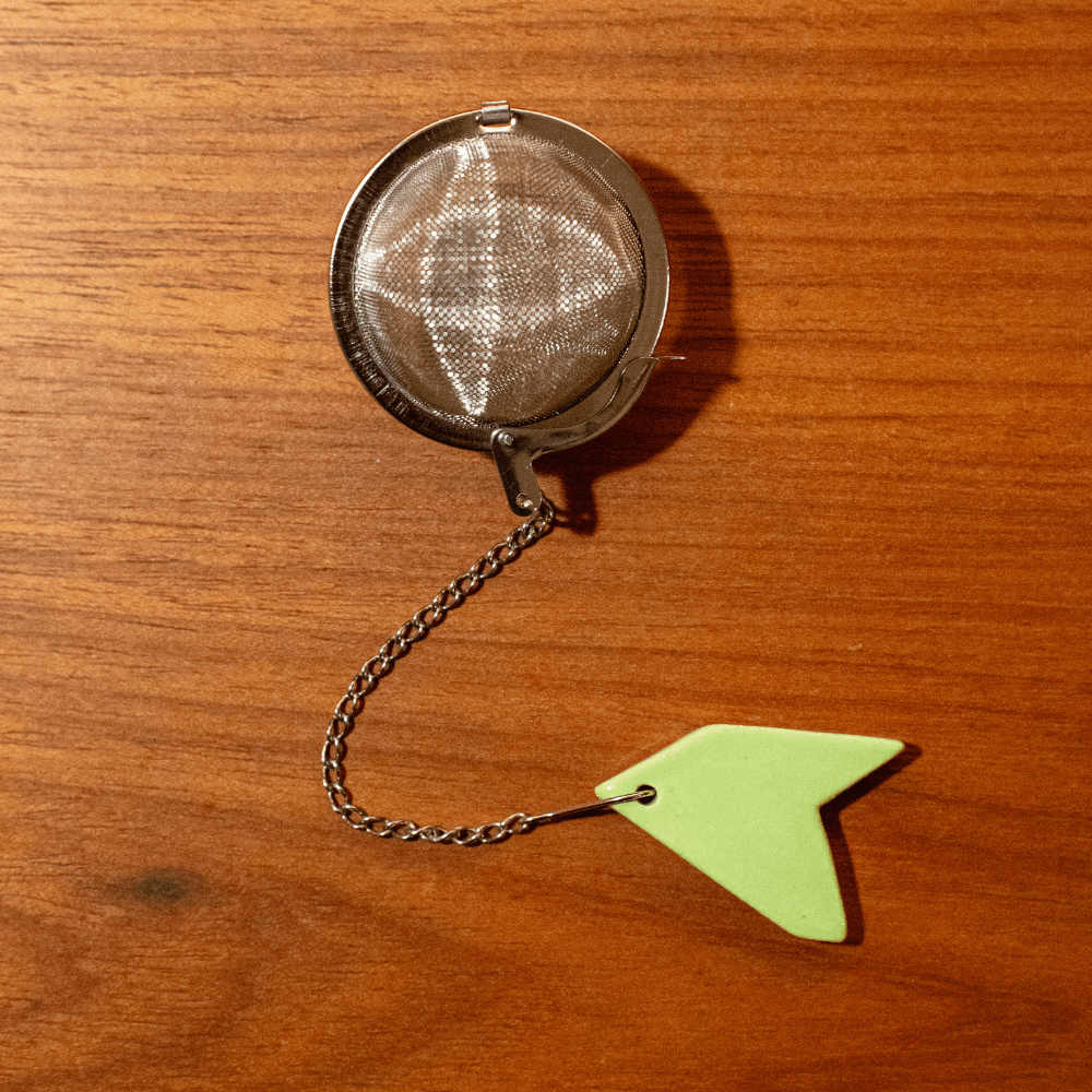 Infusor-de-Aco-Inox-Corrente-Berloque-Fragmentos-Verde-Claro